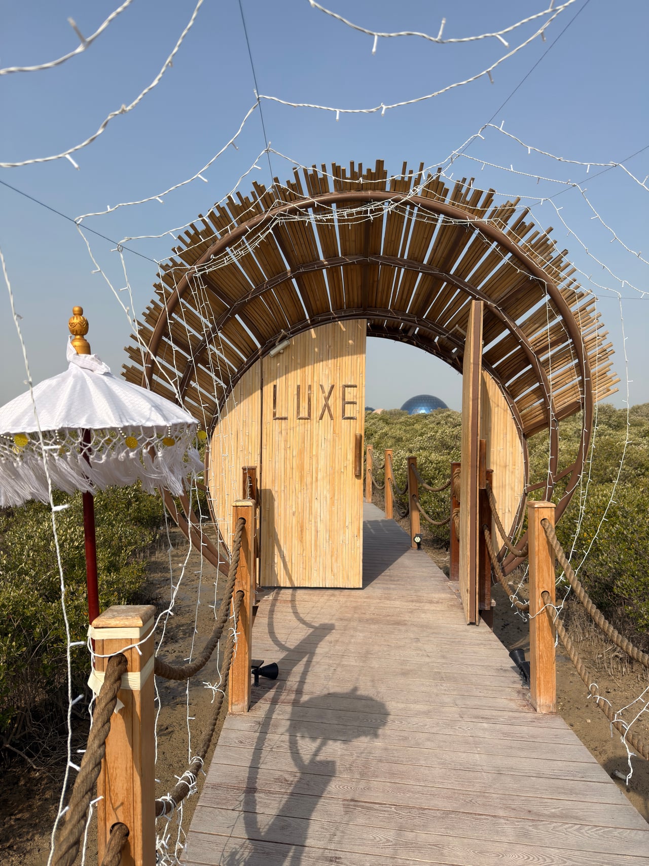 The timber entrance gate to the LuxeGlamp domes